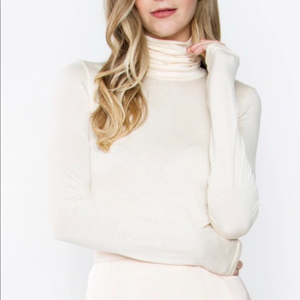 Cream turtleneck top